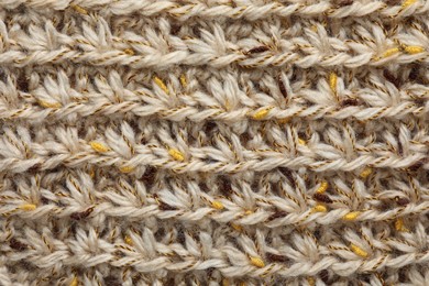 Texture of knitted fabric as background, top view