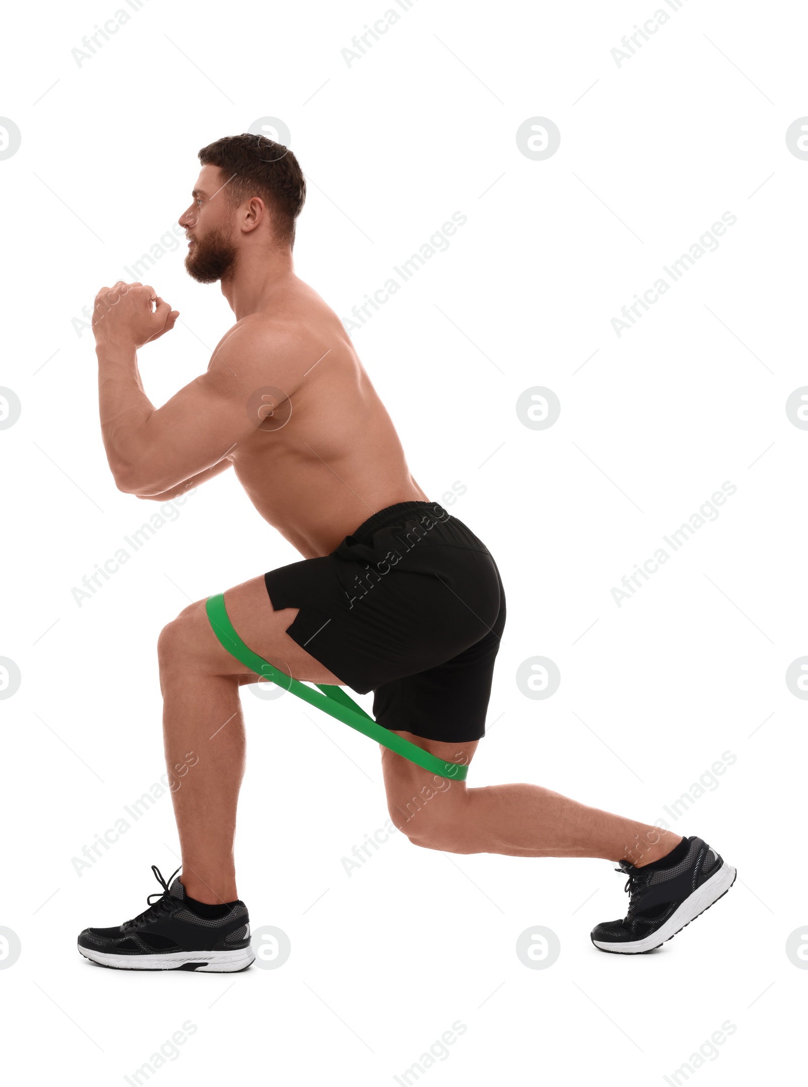 Photo of Young man exercising with elastic resistance band on white background