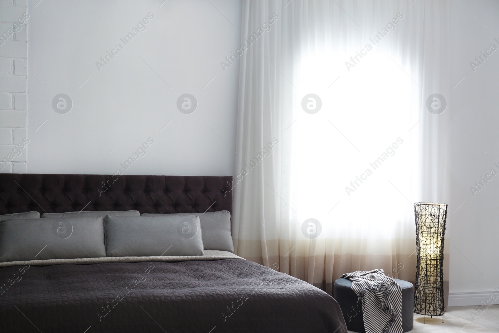 Photo of Contemporary room interior with comfortable double bed