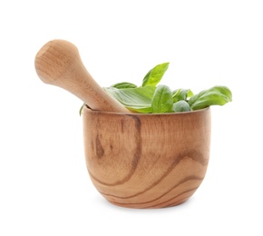 Photo of Mortar with fresh green basil leaves on white background