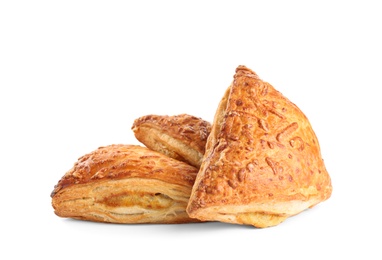 Photo of Fresh tasty puff pastry on white background