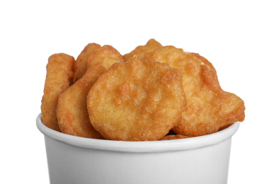 Photo of Bucket with tasty chicken nuggets isolated on white, closeup