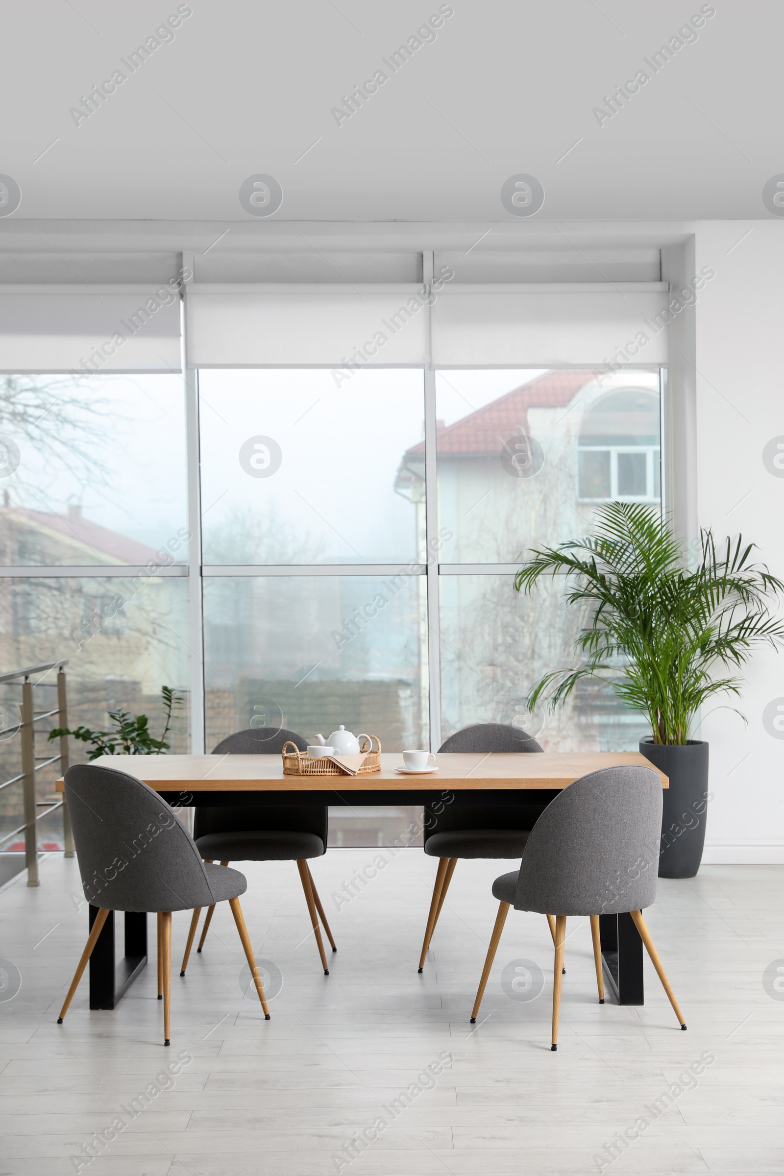 Photo of Modern room interior with chairs and table