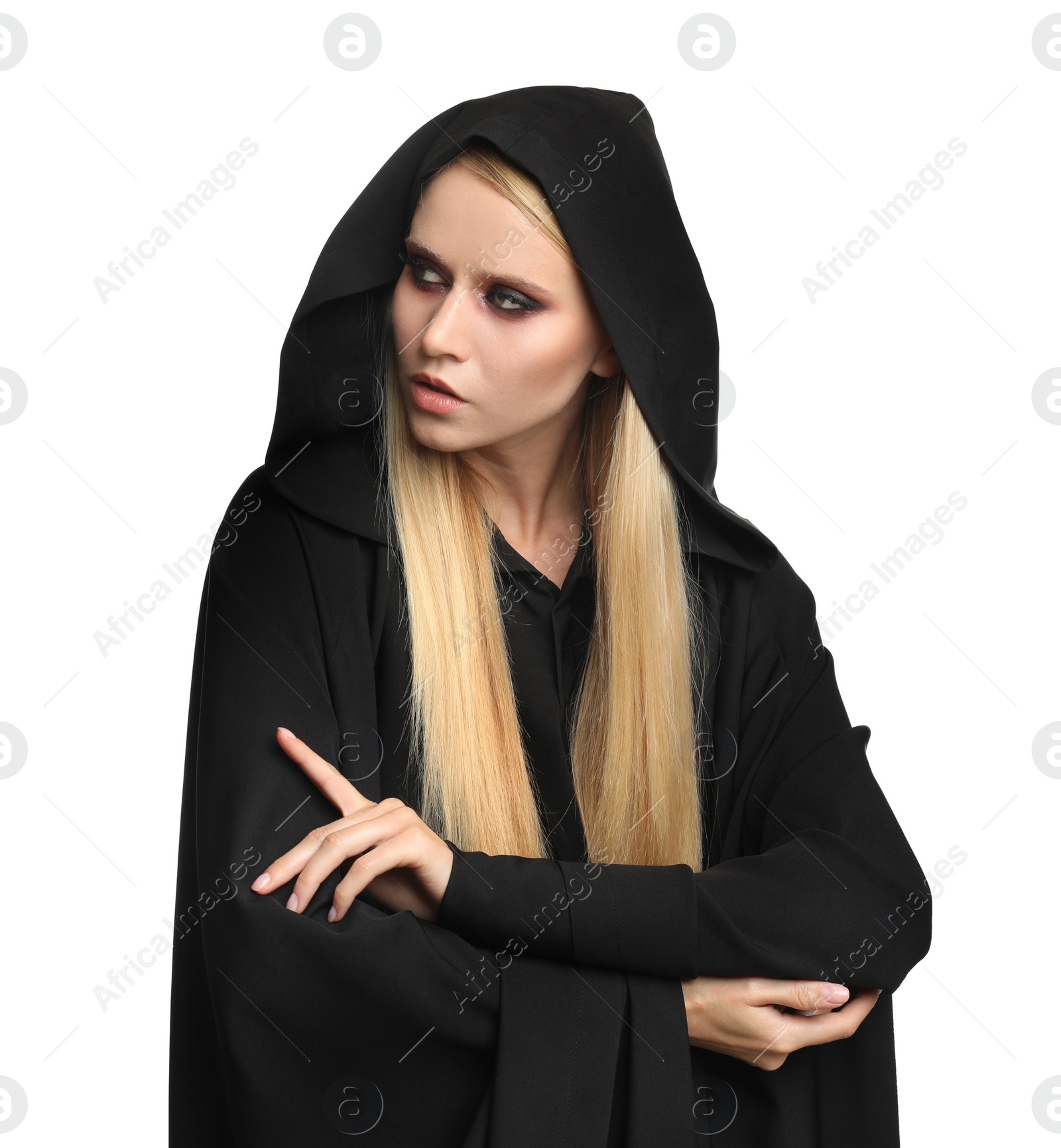 Photo of Witch in black mantle isolated on white. Scary fantasy character