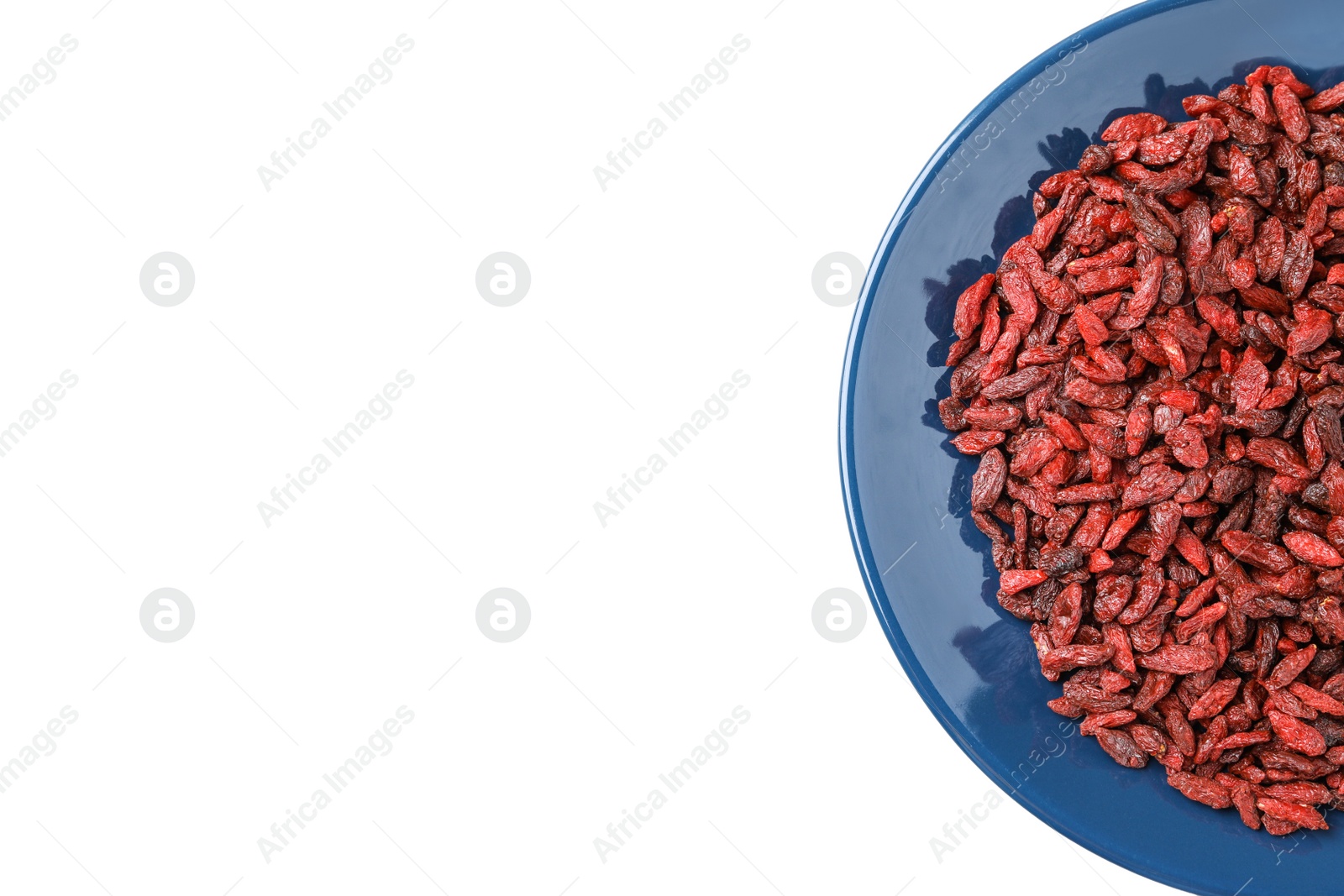 Photo of Dried goji berries on white table, top view. Space for text