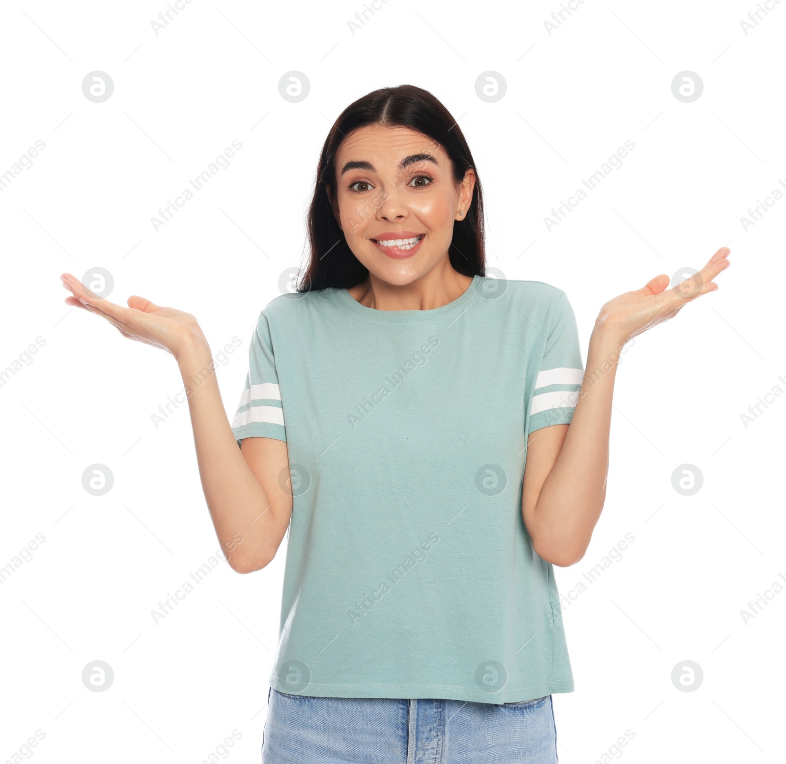 Photo of Embarrassed young woman in shirt on white background