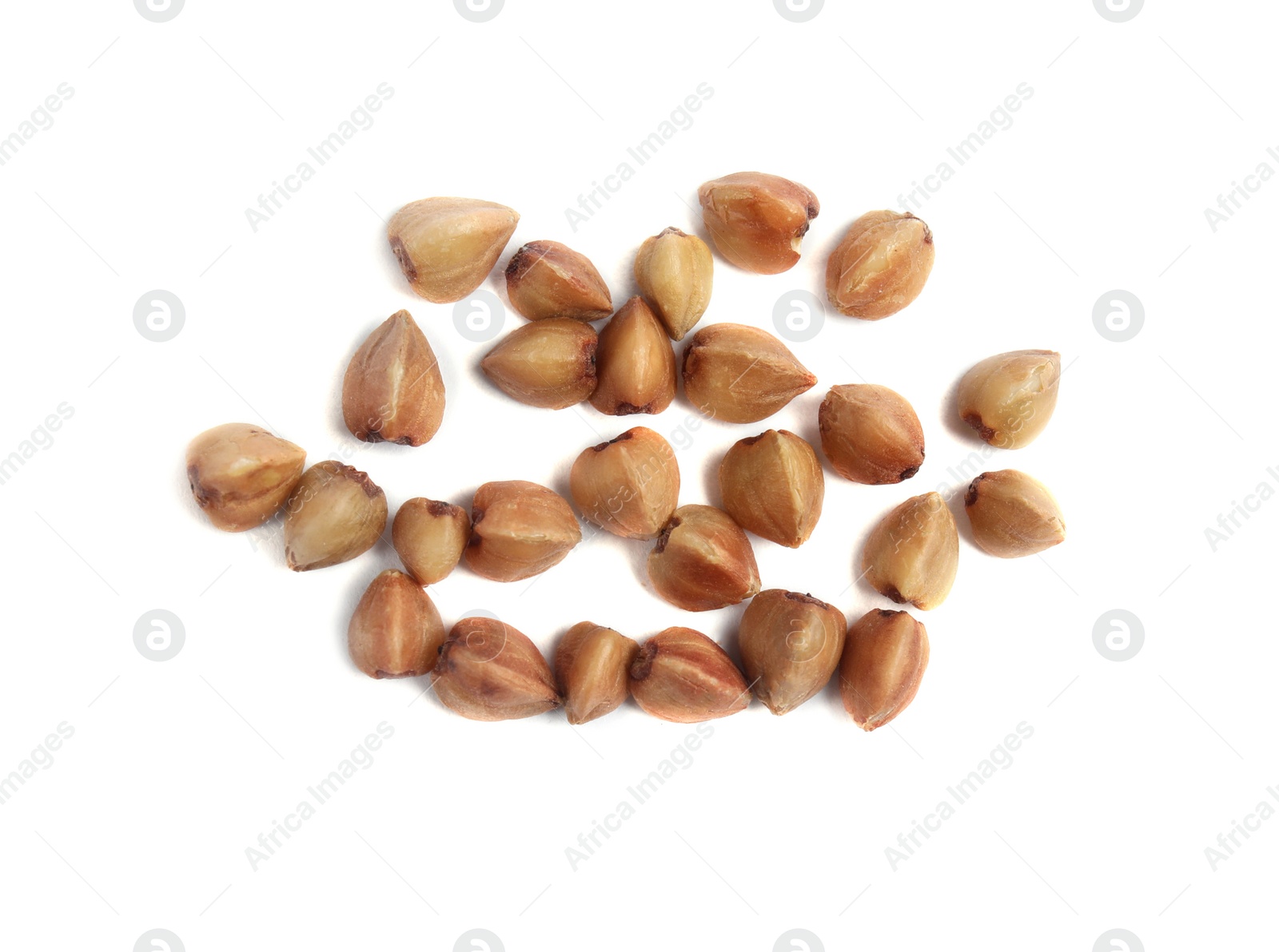 Photo of Uncooked buckwheat on white background, top view