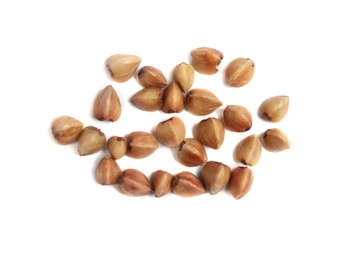 Uncooked buckwheat on white background, top view