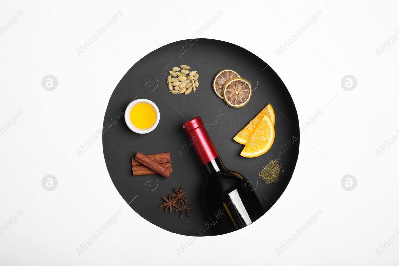 Photo of Composition with ingredients for mulled wine on white background, top view