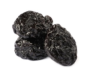 Sweet dried prunes on white background. Healthy snack