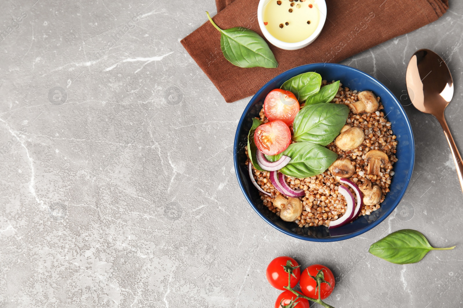 Photo of Flat lay composition with tasty buckwheat porridge marble table, space for text