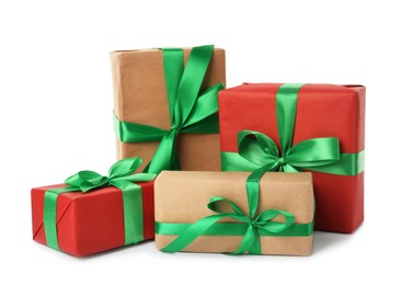 Photo of Different beautifully wrapped gift boxes on white background