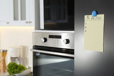 Photo of Blank To do list on fridge in kitchen. Space for text