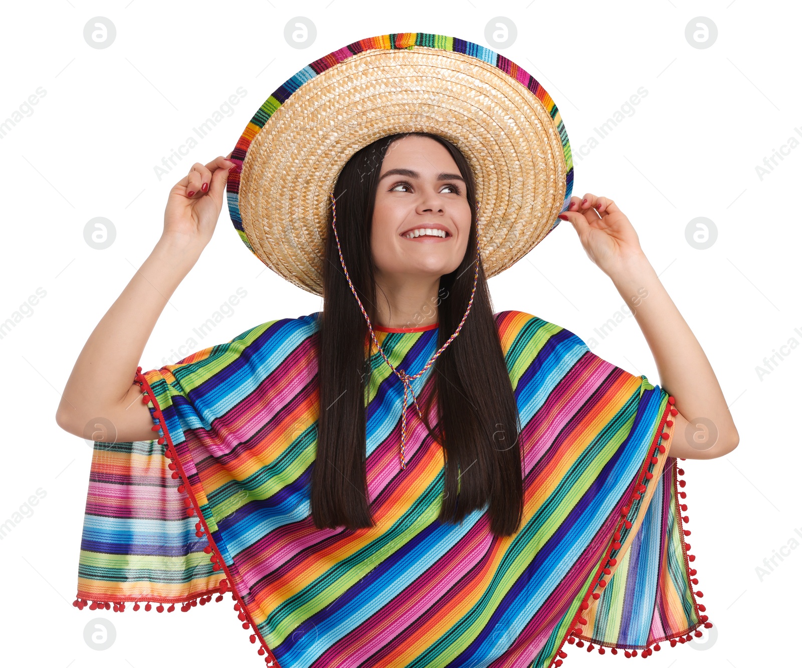 Photo of Young woman in Mexican sombrero hat and poncho on white background