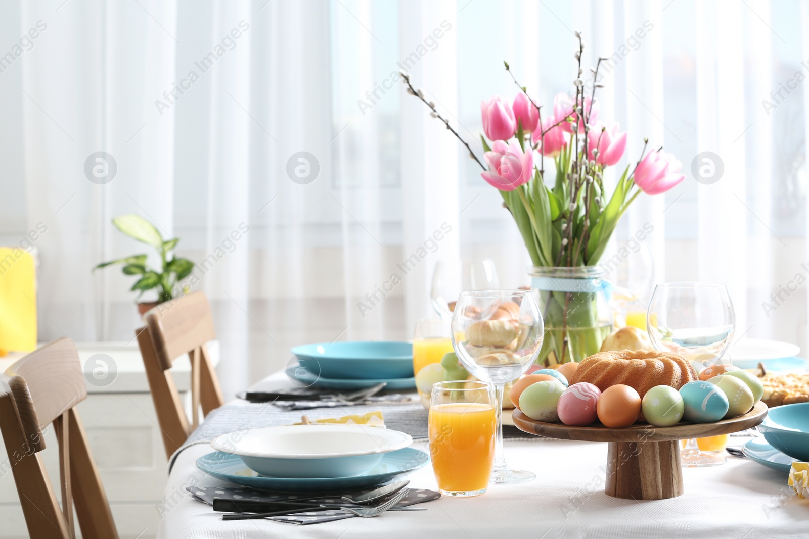 Photo of Festive Easter table setting with traditional meal, space for text