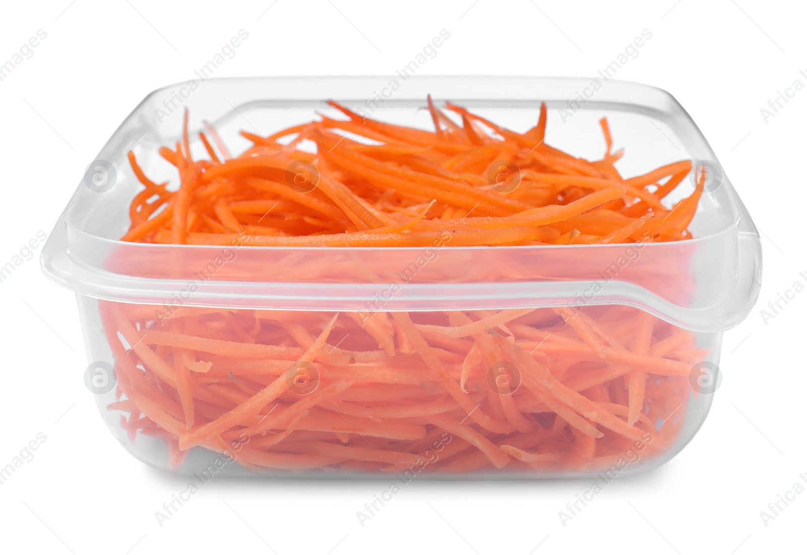 Photo of Fresh shredded carrots in plastic container isolated on white