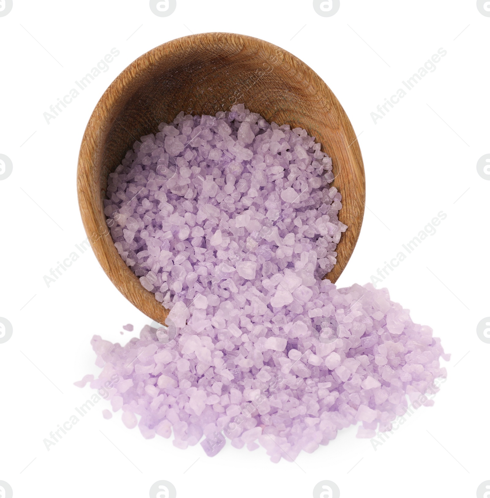 Photo of Overturned bowl with violet sea salt isolated on white