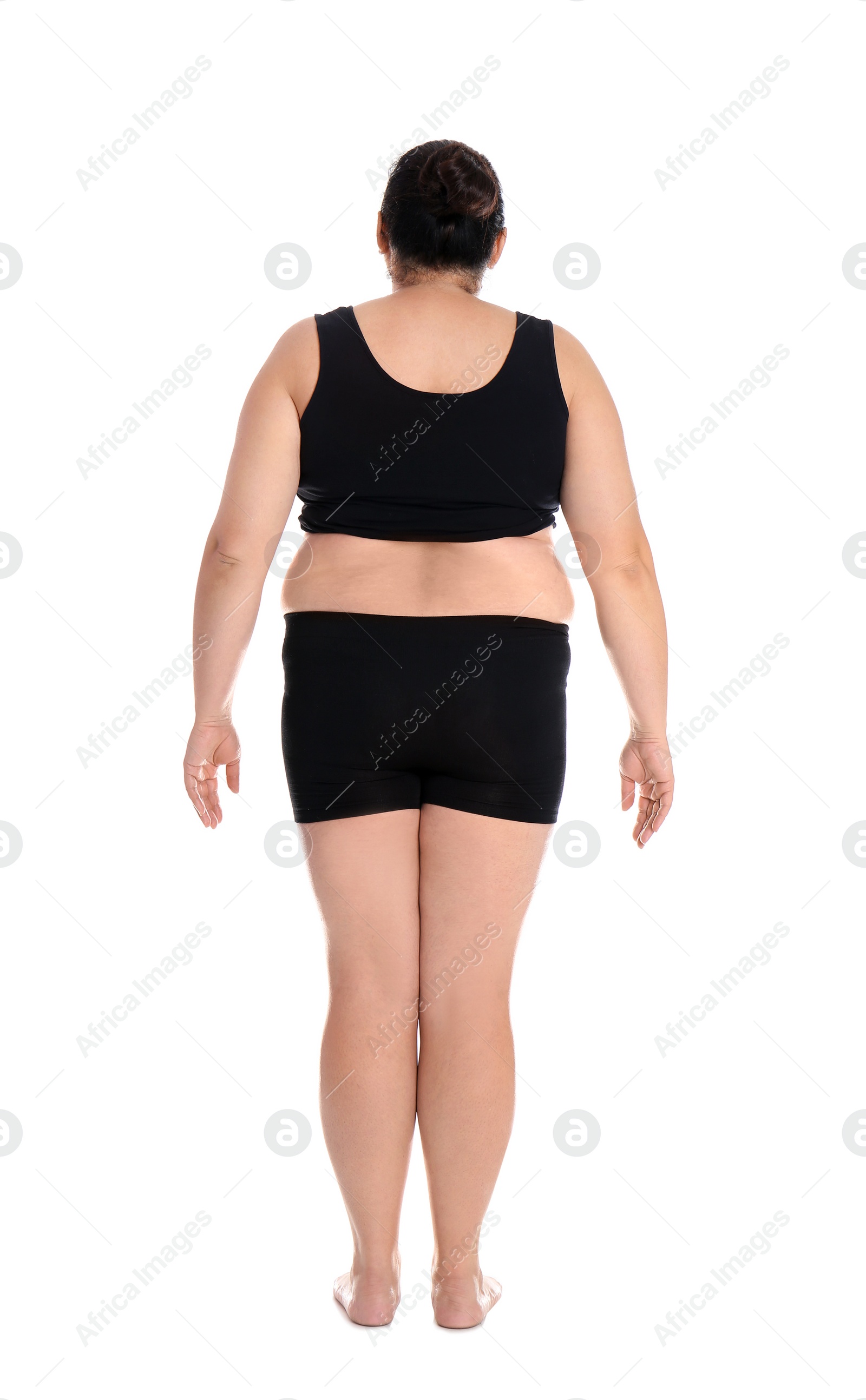 Photo of Fat woman on white background. Weight loss