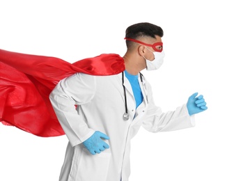Photo of Doctor wearing face mask and cape on white background. Super hero power for medicine