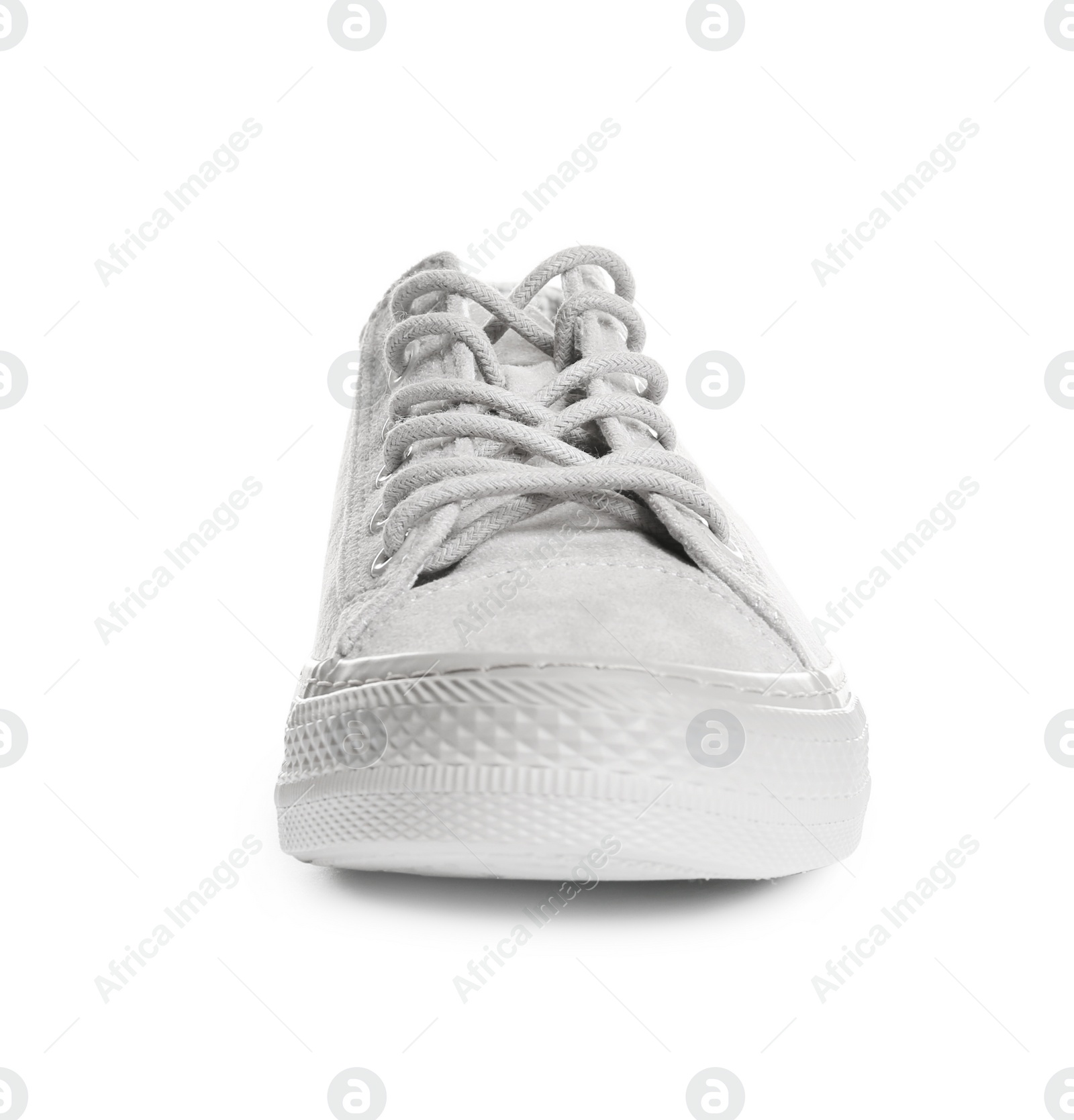 Photo of Stylish sneaker on white background. Trendy footwear