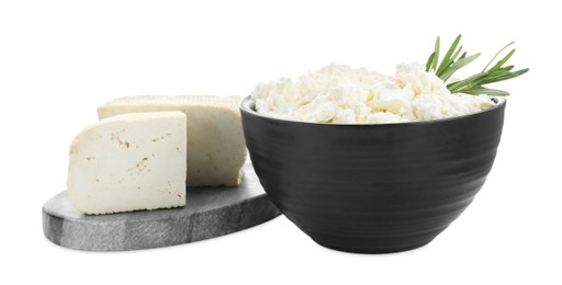 Photo of Different types of delicious tofu cheese with rosemary on white background