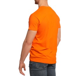 Man wearing orange t-shirt on white background, closeup. Mockup for design