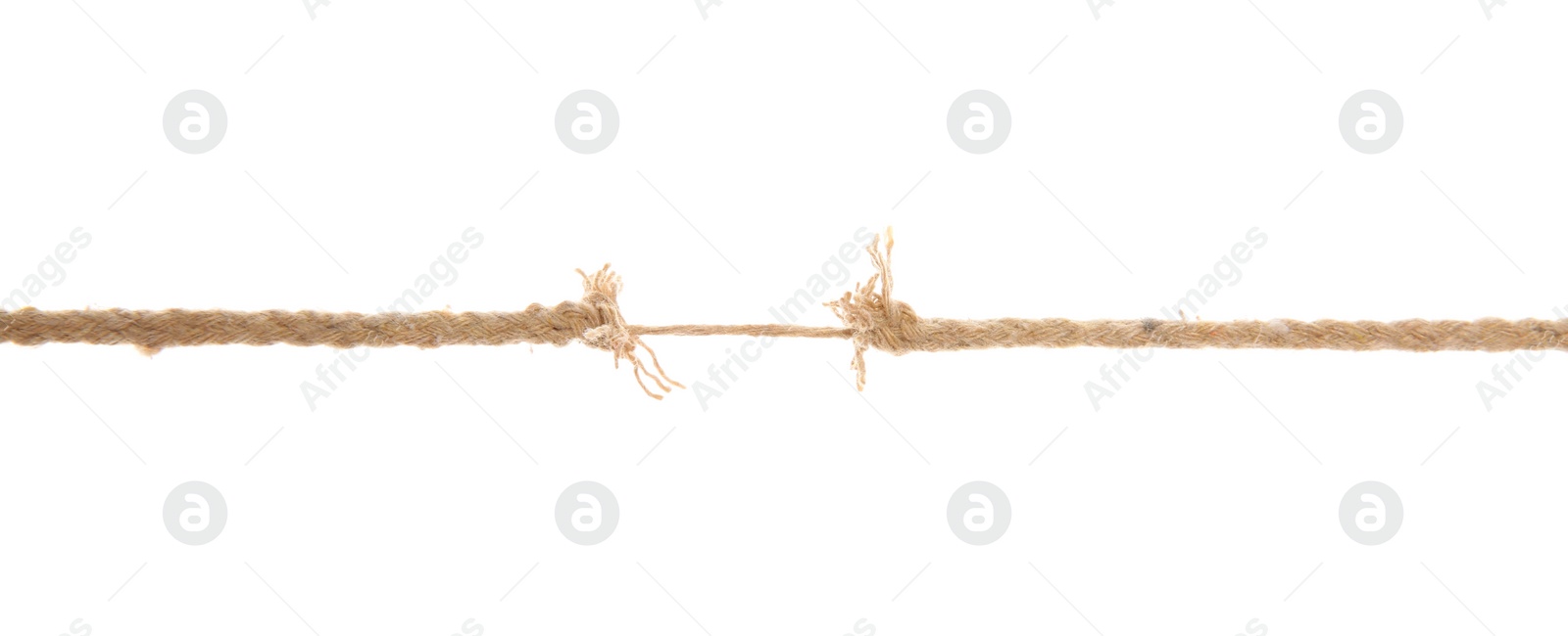 Photo of Frayed rope at breaking point on white background