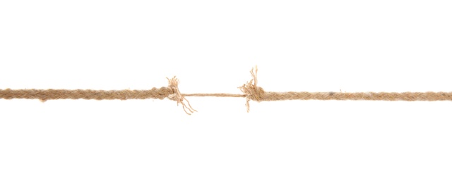 Photo of Frayed rope at breaking point on white background