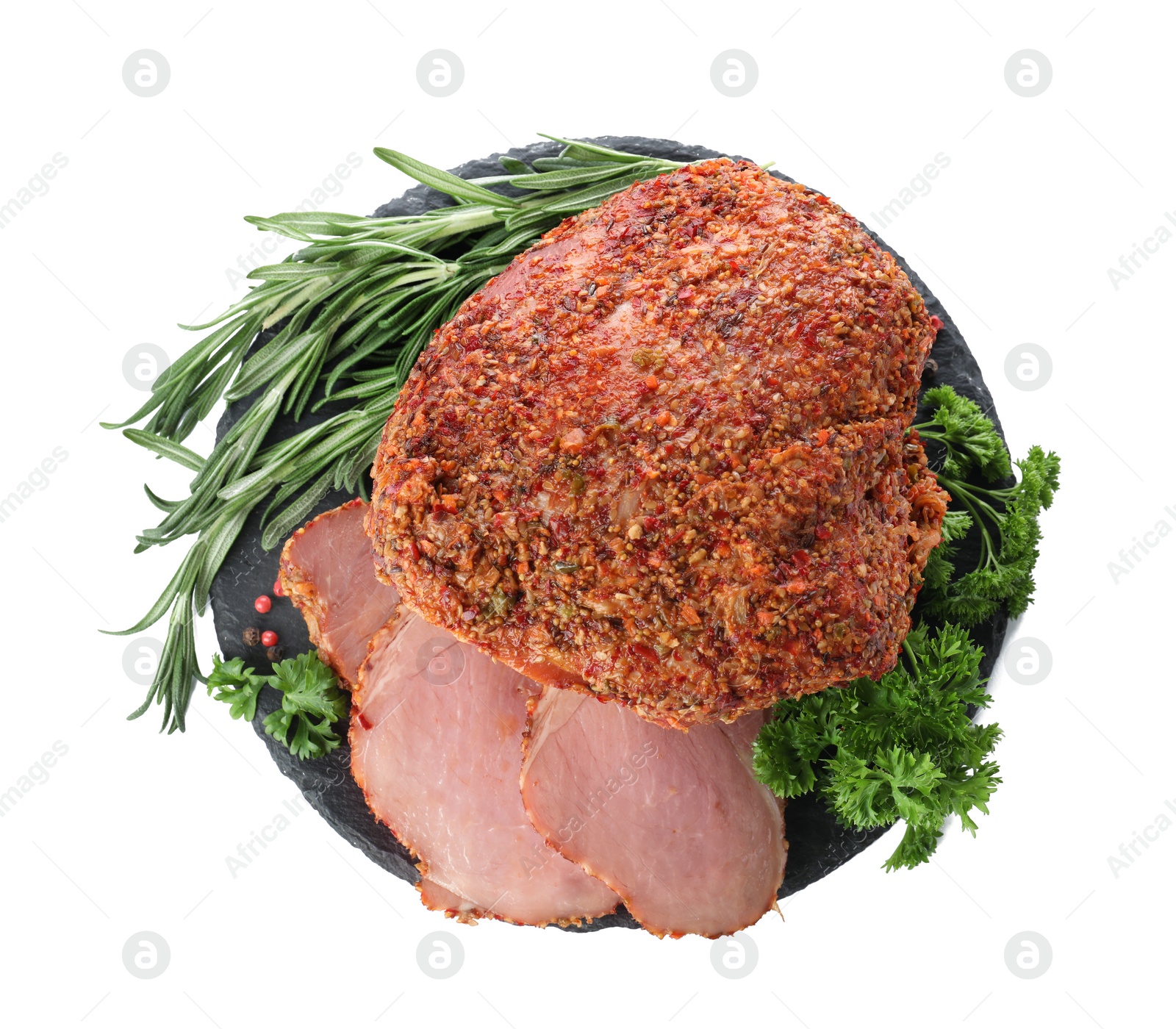 Photo of Slate plate with homemade delicious ham on white background, top view. Festive dinner