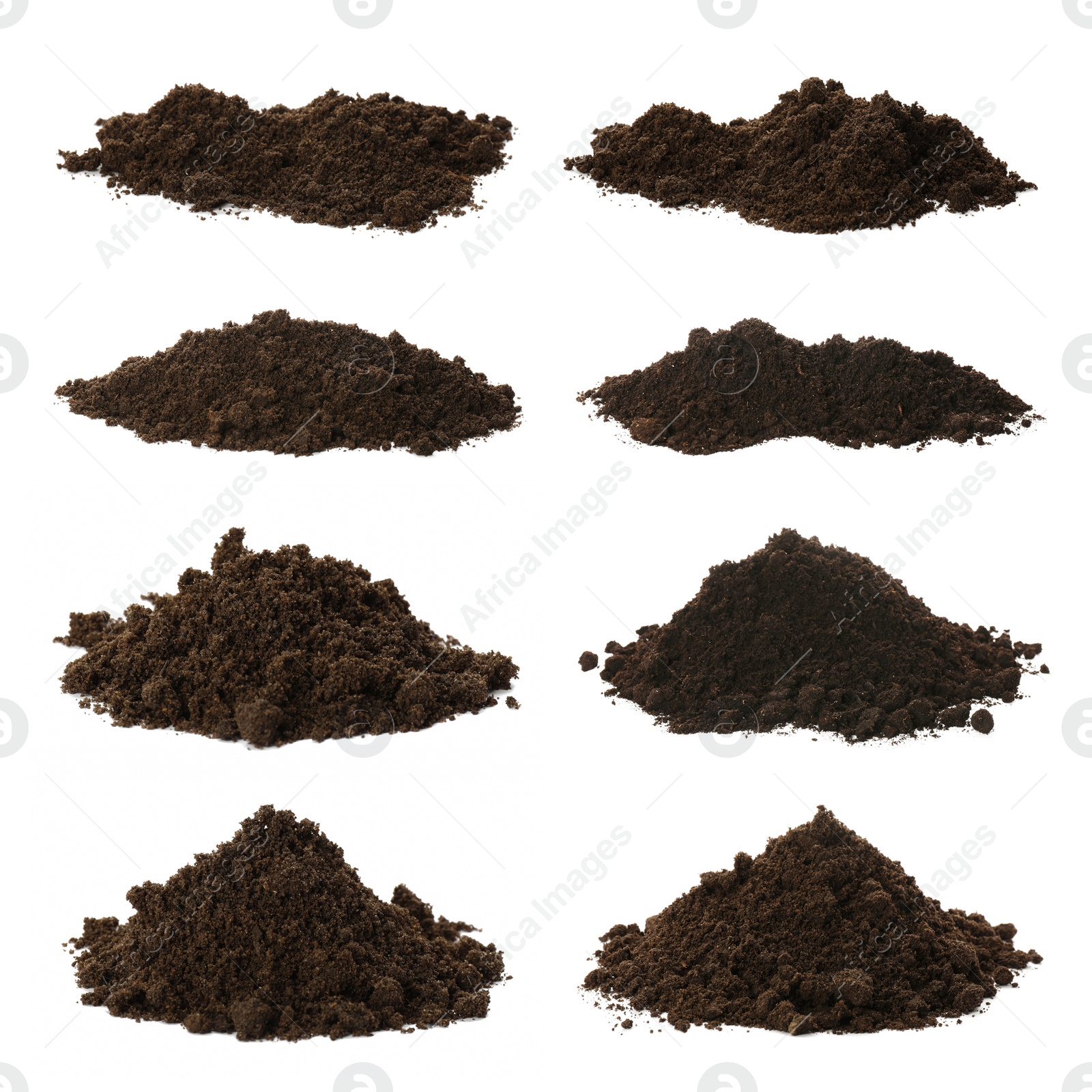 Image of Set with piles of fertile soil on white background