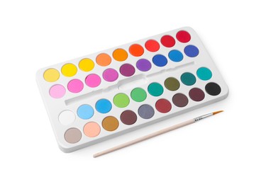 Photo of Watercolor palette and brush isolated on white, above view