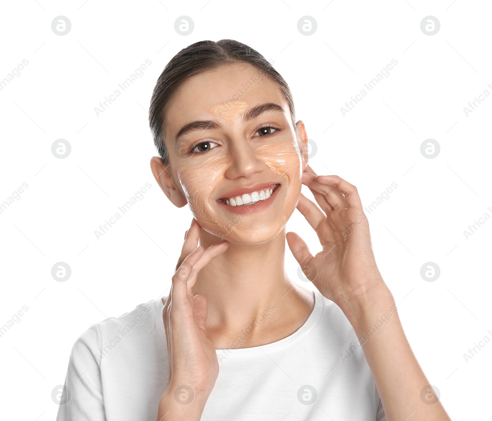 Photo of Happy young woman with organic mask on her face against white background