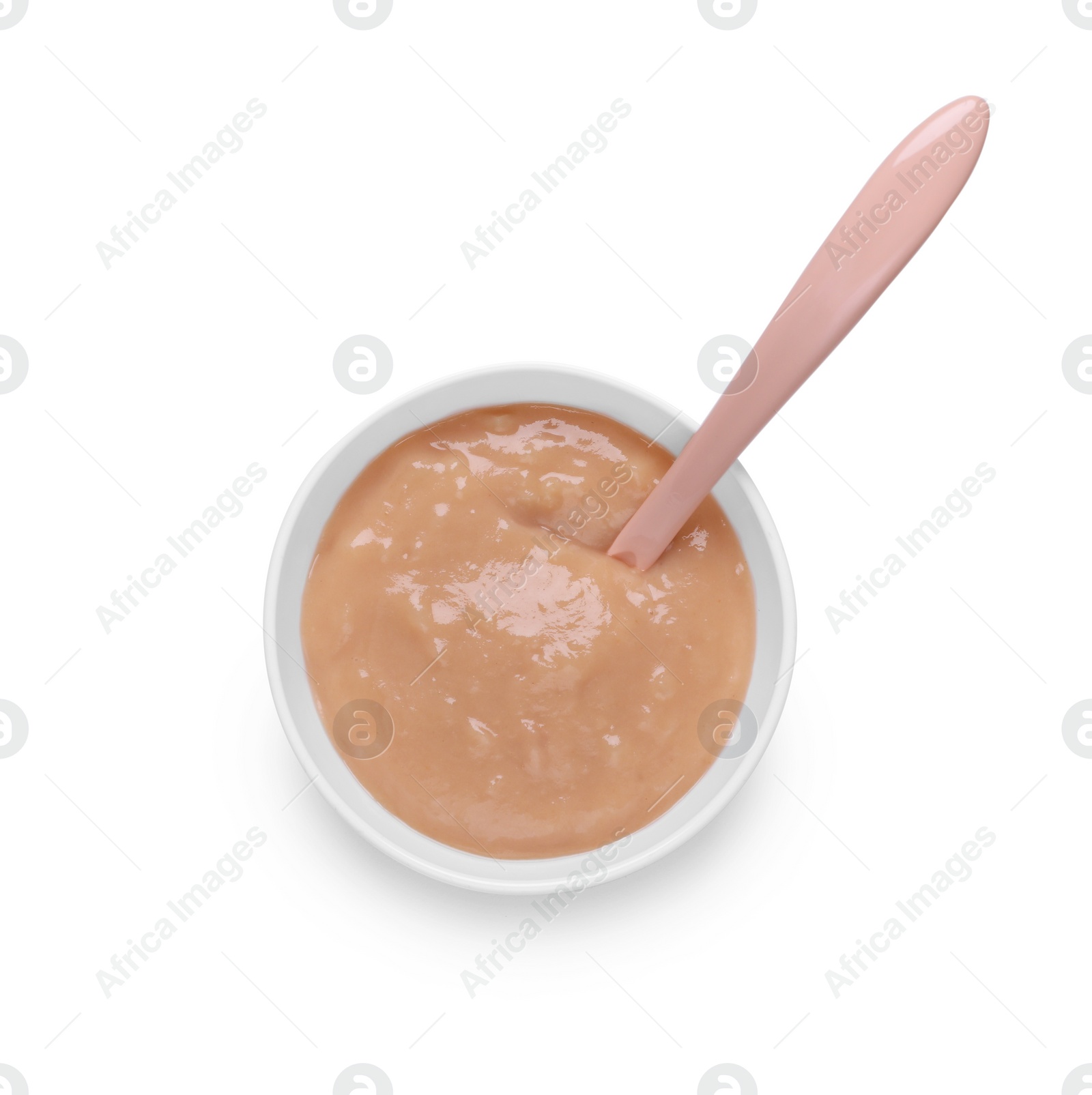 Photo of Bowl with healthy baby food and spoon isolated on white, top view