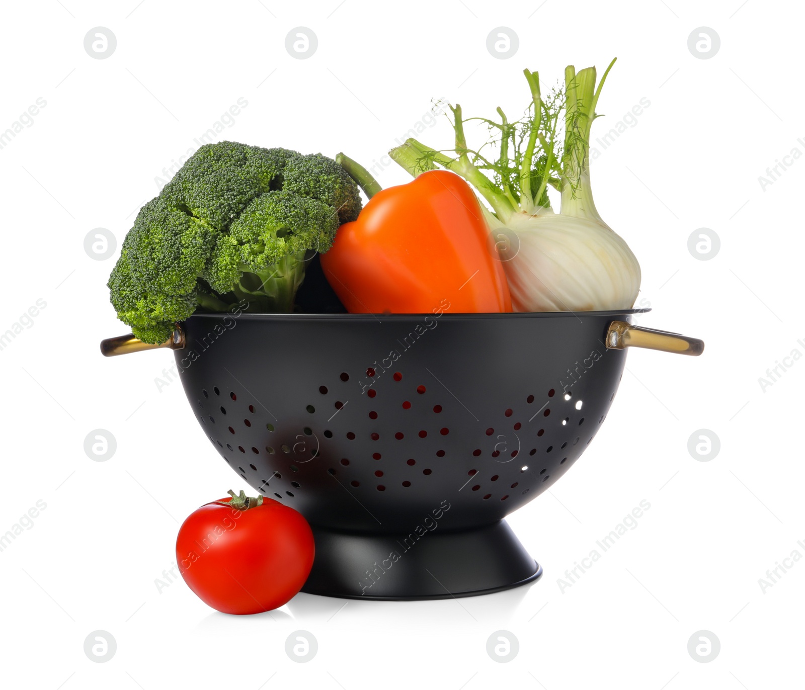 Photo of Colander with fresh vegetables isolated on white