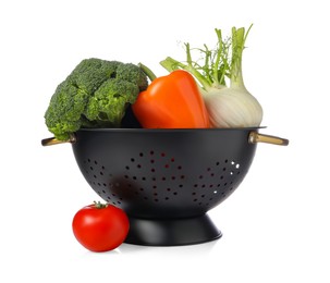 Photo of Colander with fresh vegetables isolated on white