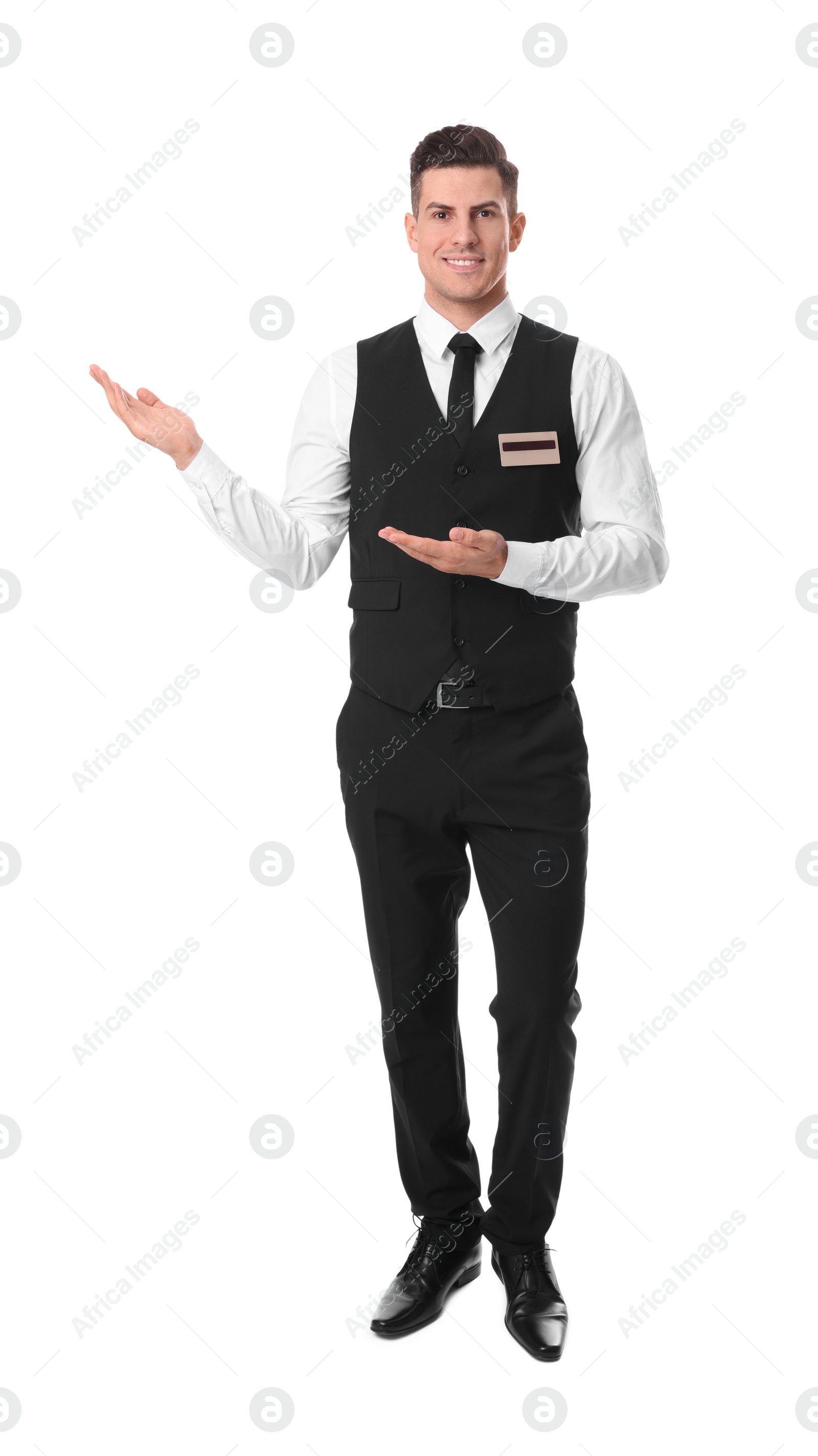 Photo of Full length portrait of happy receptionist in uniform on white background