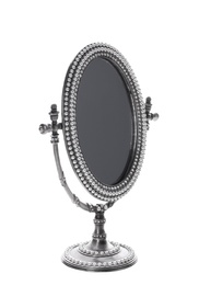 Vintage small mirror on white background