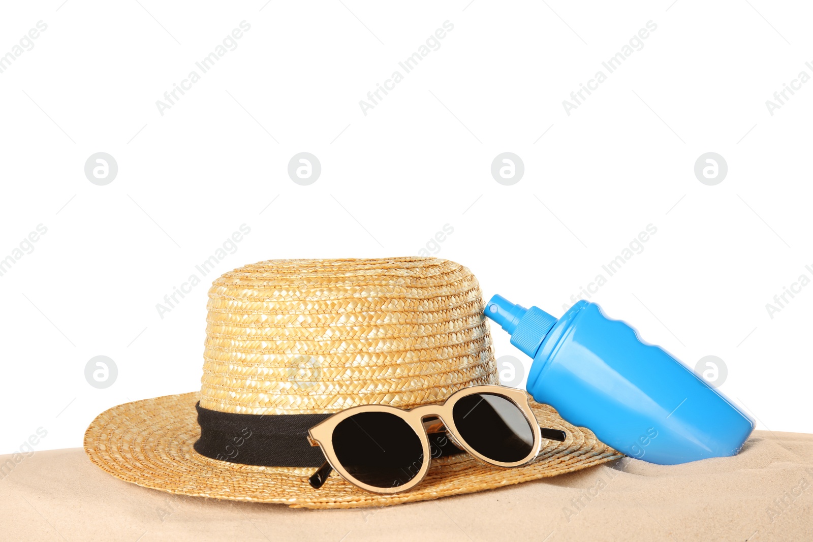 Photo of Bottle of sun protection body cream, glasses and straw hat on white background