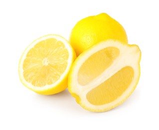 Photo of Cut and whole ripe lemons isolated on white