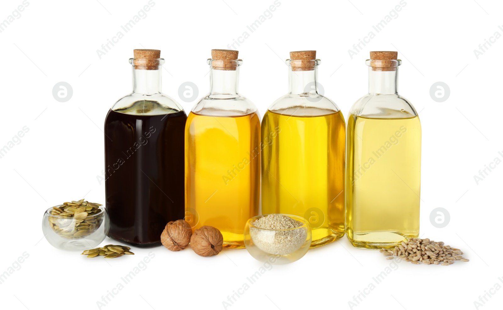 Photo of Vegetable fats. Bottles of different cooking oils and ingredients isolated on white