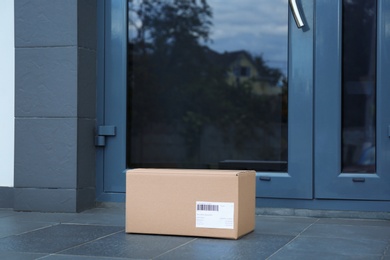 Parcel box on floor near office entrance