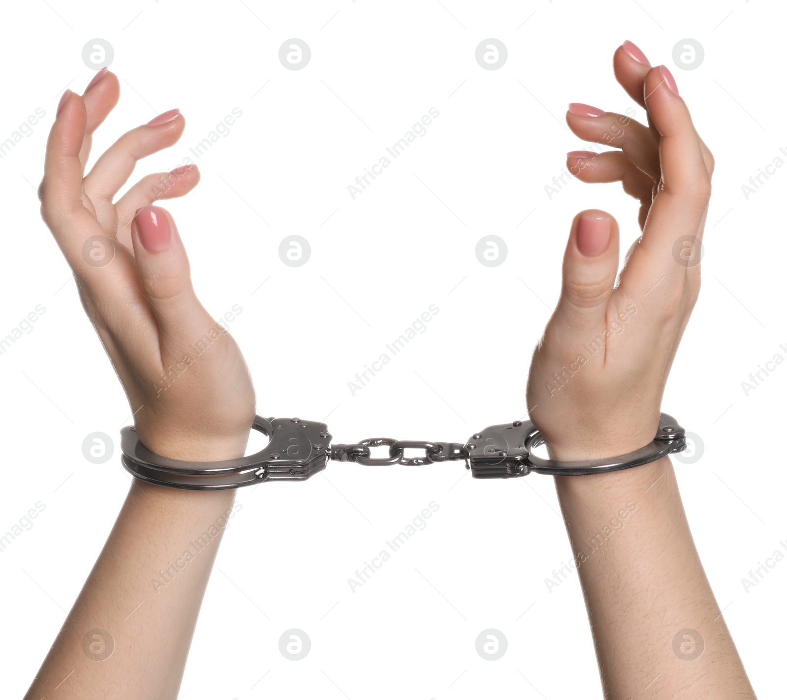 Photo of Freedom concept. Woman with handcuffs on white background, closeup