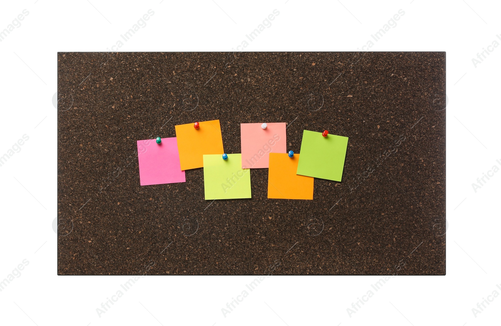 Photo of Empty notes pinned to cork board on white background