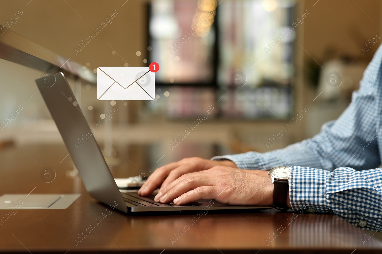 Image of Email. Man using laptop indoors, closeup. Incoming letter notification near device