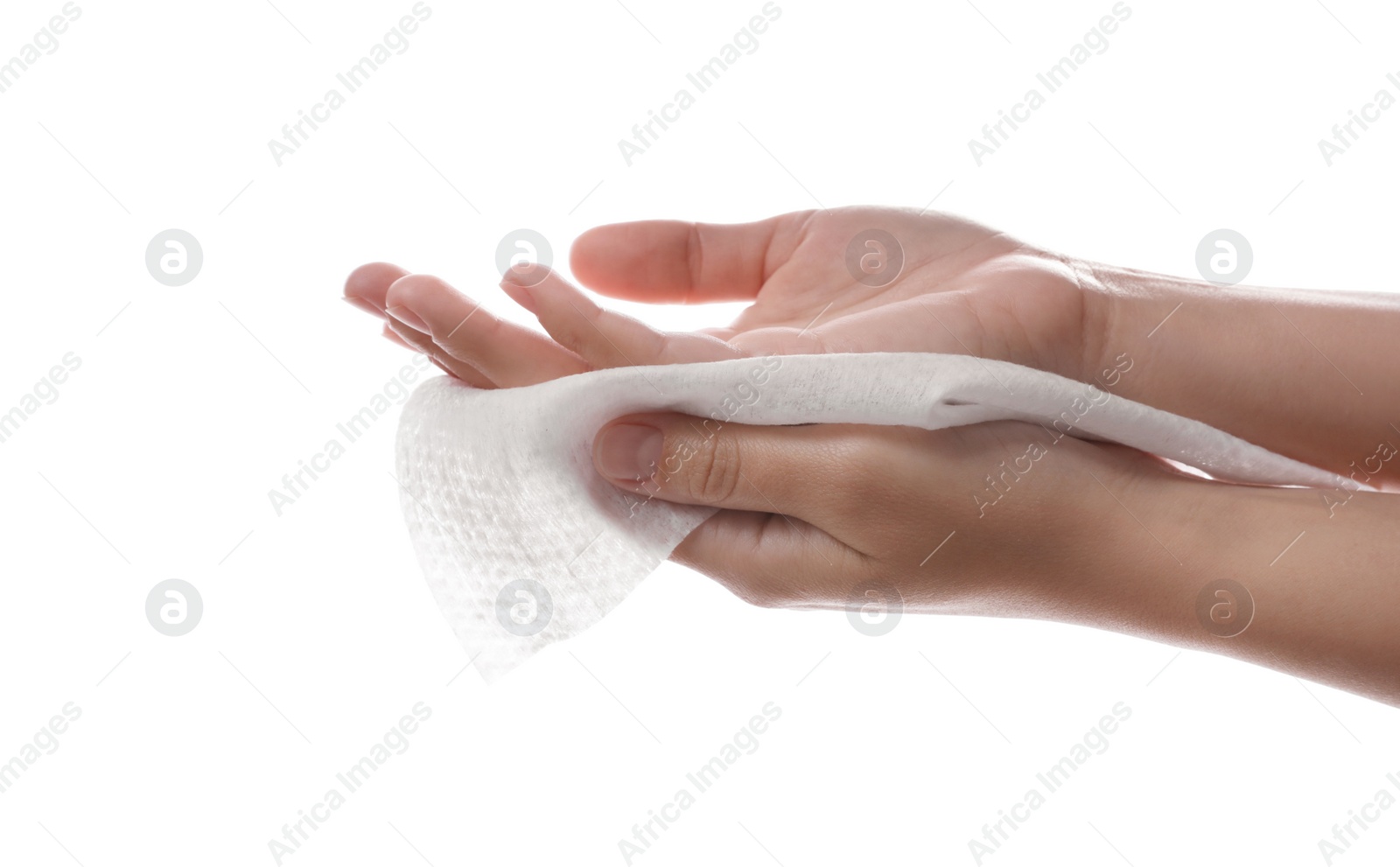 Photo of Woman cleaning hand with wet wipe on white background, closeup