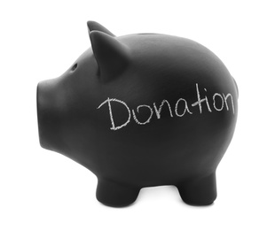 Photo of Black piggy bank with word DONATION on white background
