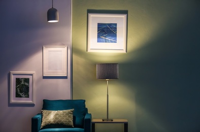 Photo of Modern room interior with stylish lamp