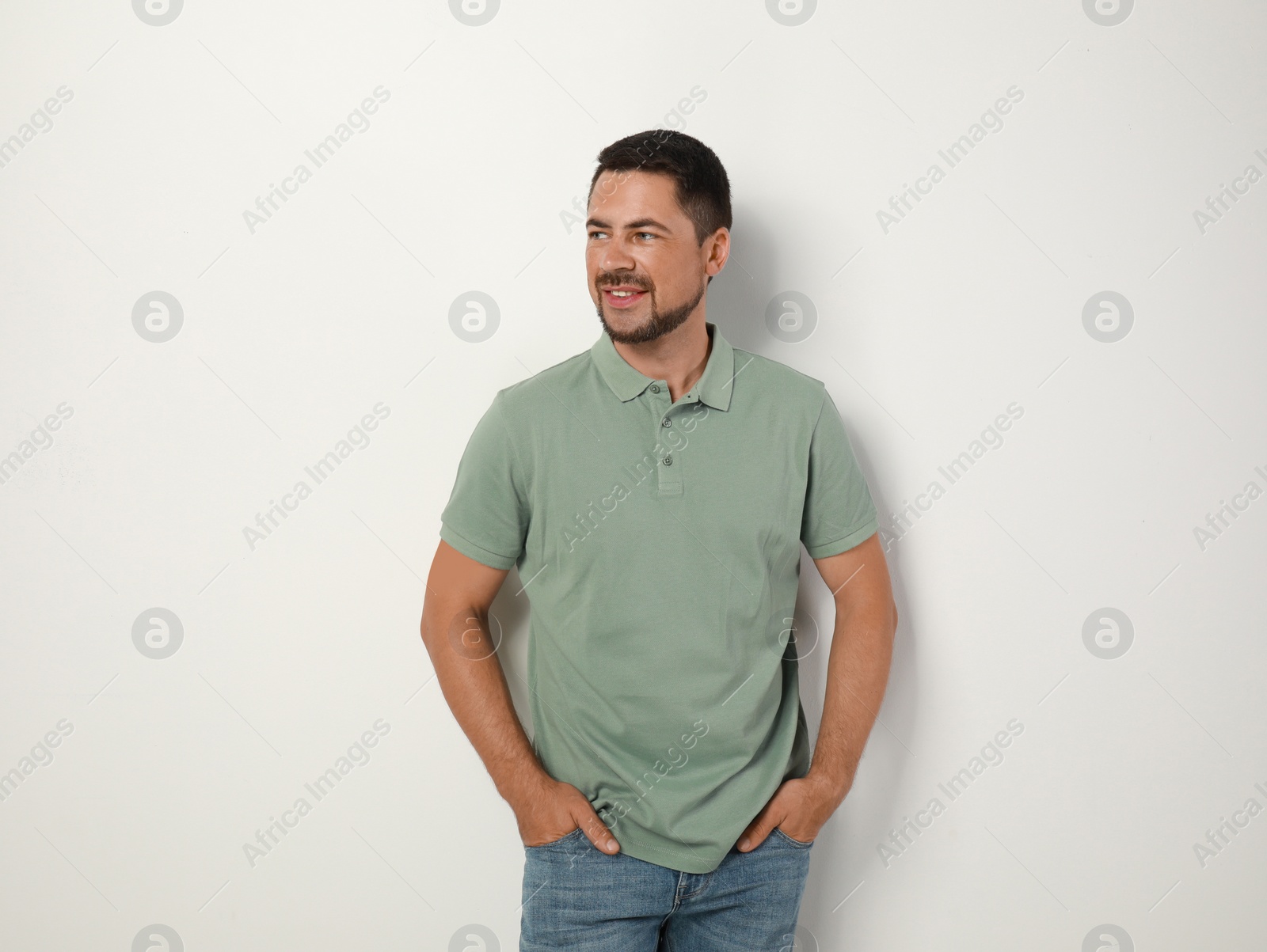 Photo of Portrait of handsome man on light background