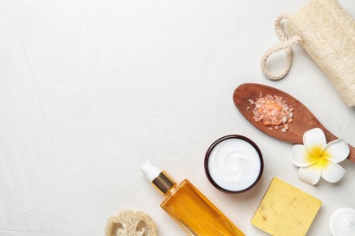 Photo of Flat lay composition with body care products and space for text on light background