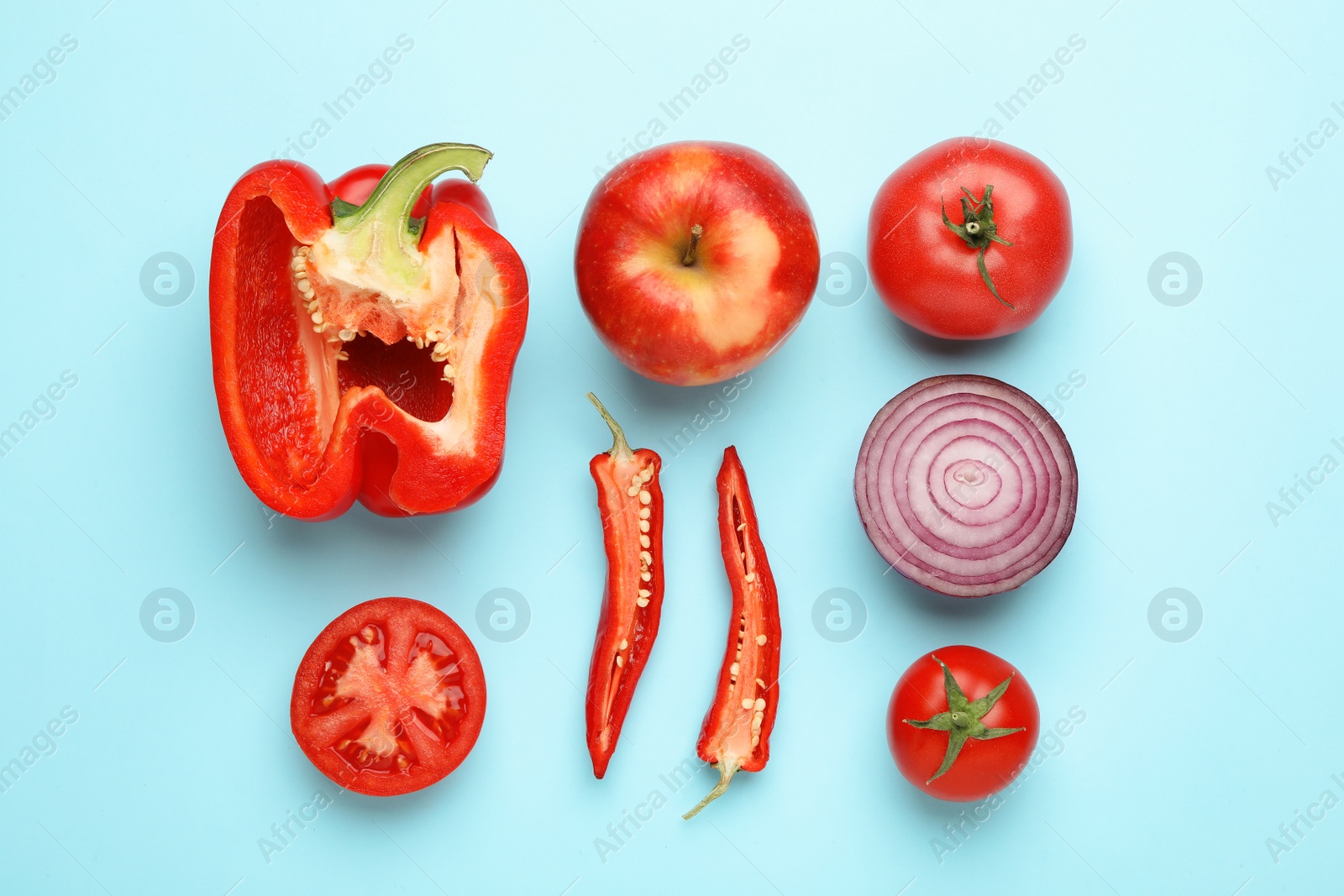 Photo of Flat lay composition with fresh ripe vegetables on color background